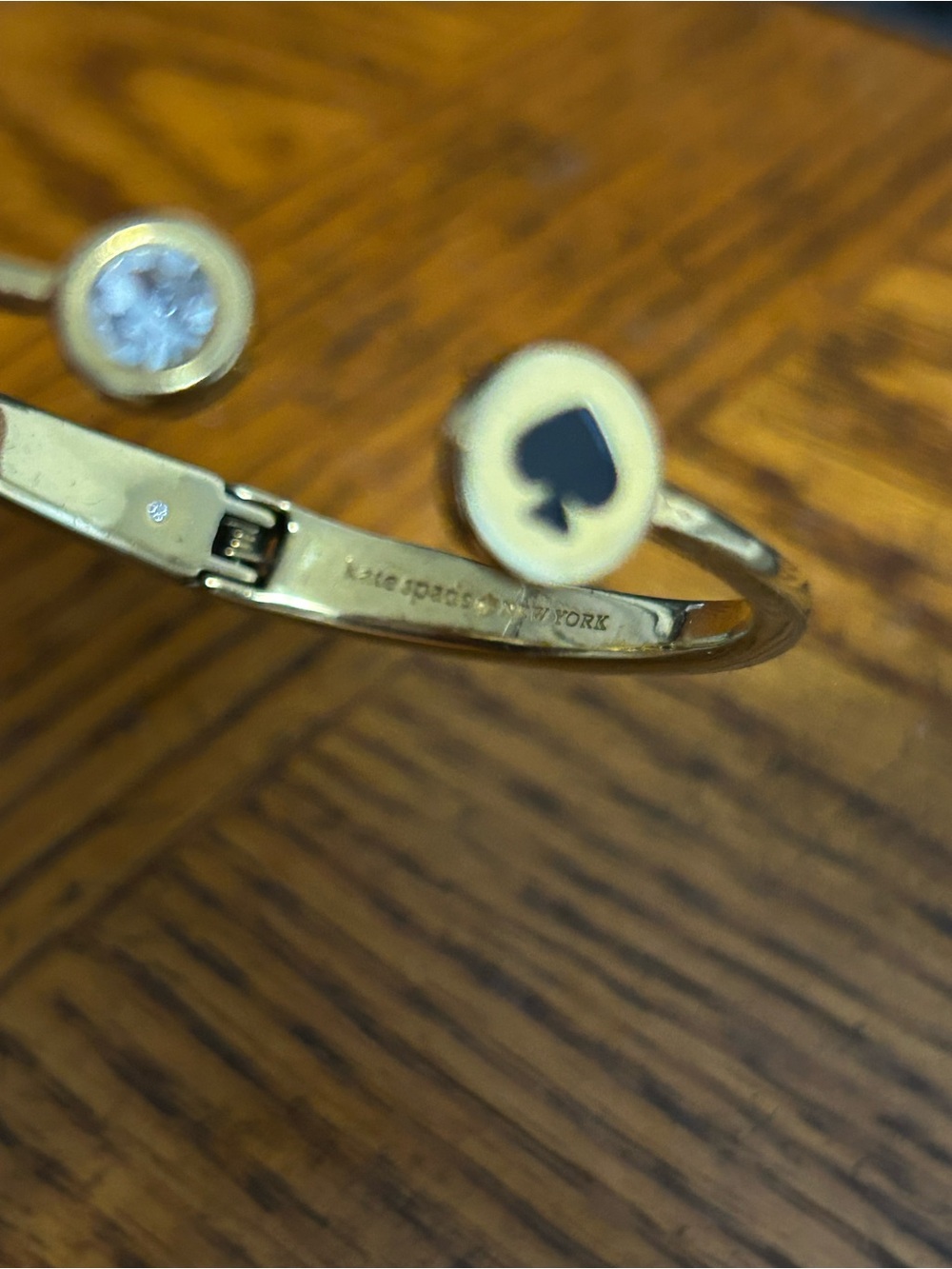 Kate ♠️ Spade Gold Tone Cuff Bracelet with Clear Crystal and Spade Accent - Picture 3 of 3